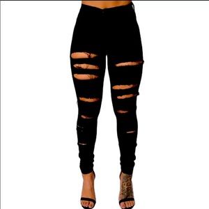 Black ripped jeans.